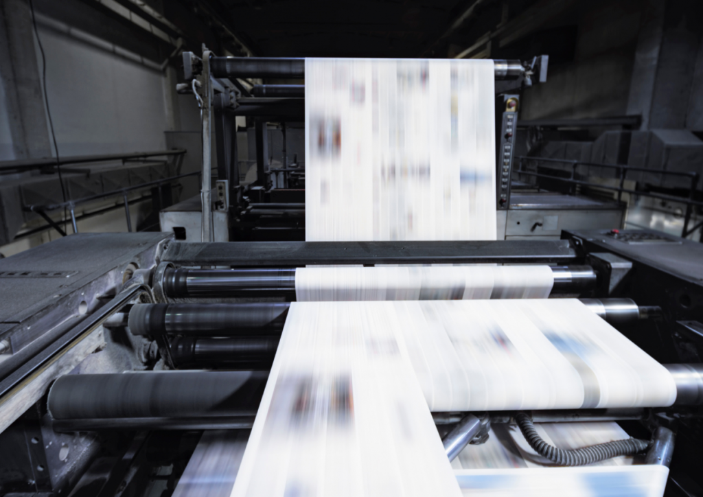 Printing press printing a newspaper