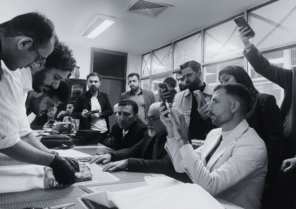 Dr. Nikolas Sarris, a senior book and paper conservator, with our trainees in Iraq